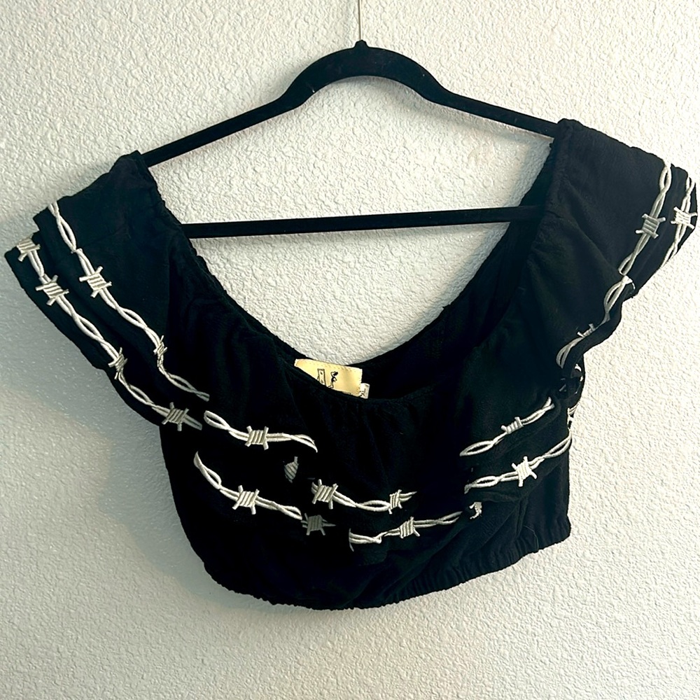 Fashion brand company barbed wire ruffle top